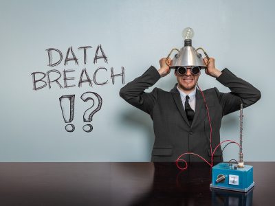 Data Breach text with vintage businessman